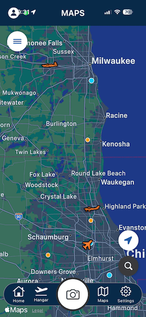 SpotterLog's own live radar map showing aircraft positions around Milwaukee and Chicago.