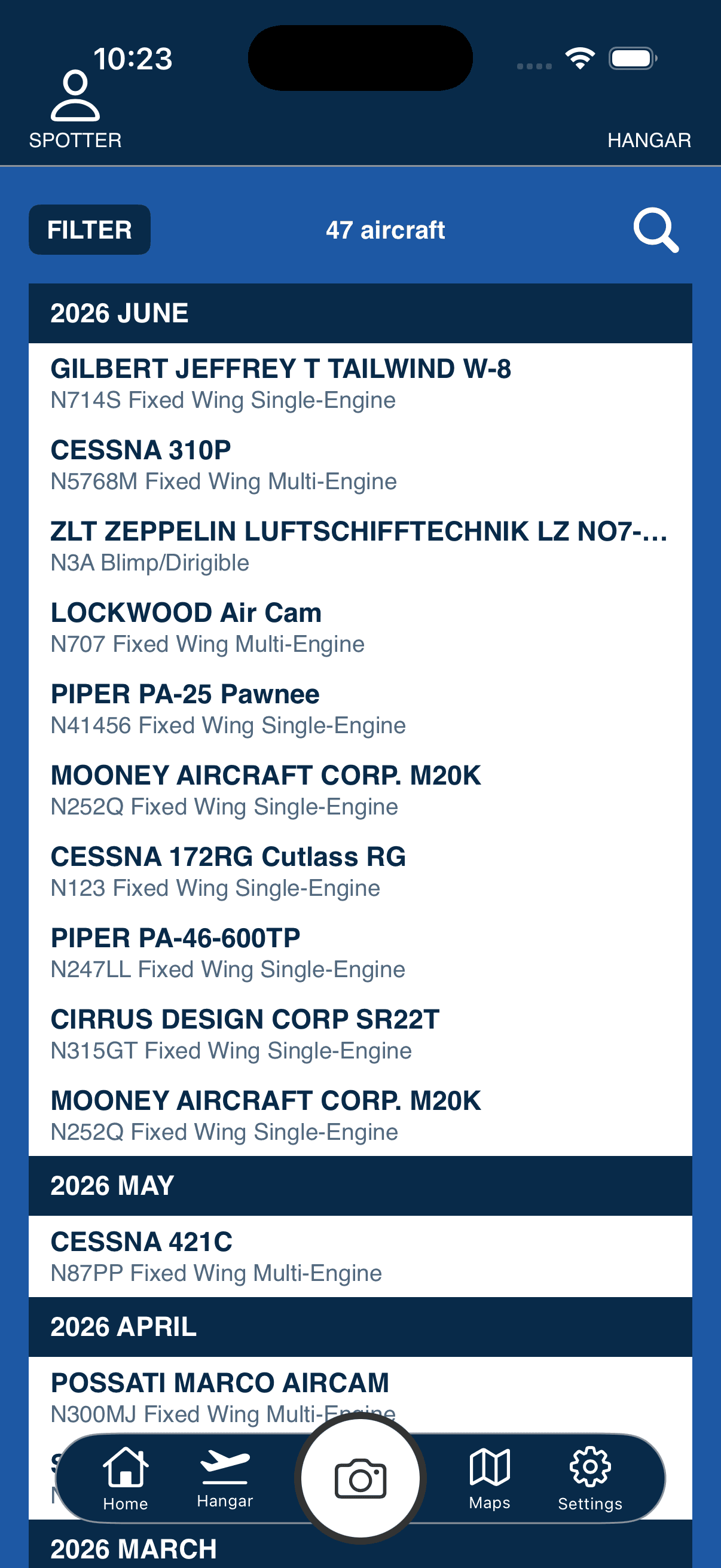 SpotterLog aircraft sighting log on iPhone — photographed planes identified by tail number